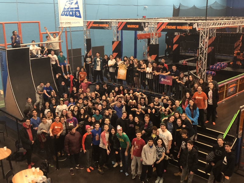 Group of people celebrating on stage