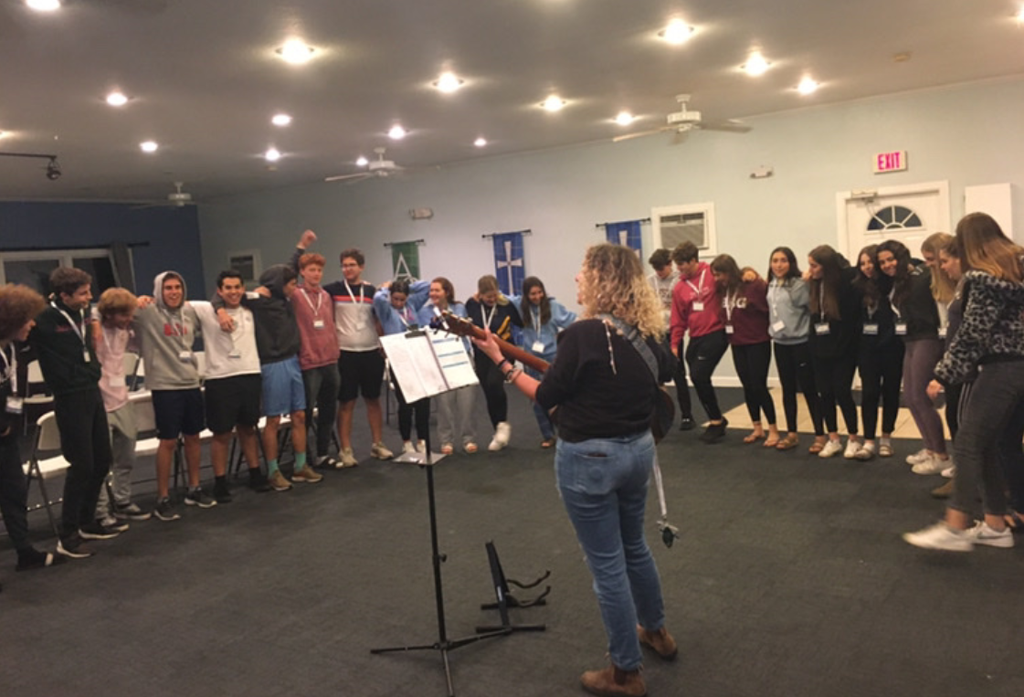 Group of people celebrating on stage