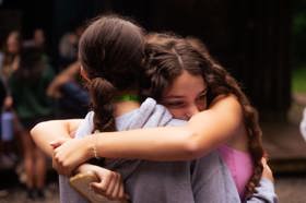 Group of people celebrating on stage