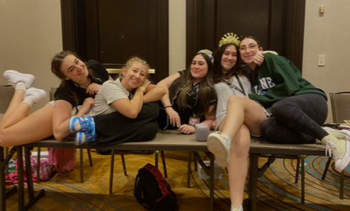 Group of people celebrating on stage