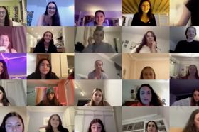 Group of people celebrating on stage