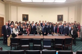 Group of people celebrating on stage