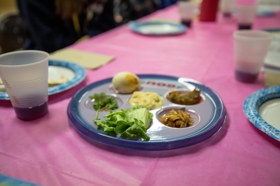 Group of people celebrating on stage