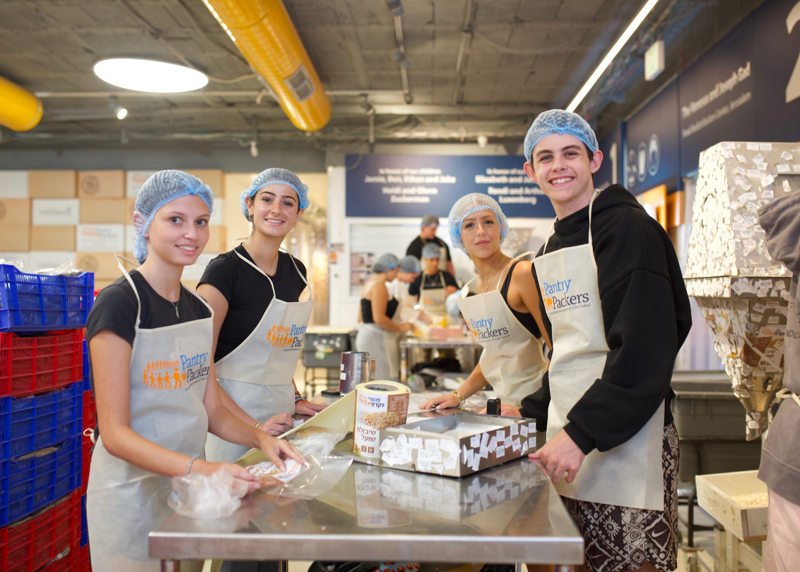 Group of diverse young people smiling at a community event