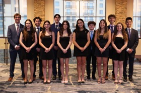 Group of people celebrating on stage