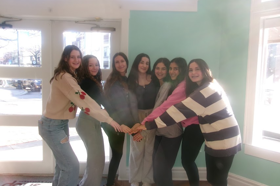 Group of people celebrating on stage