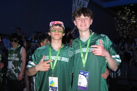 Group of people celebrating on stage