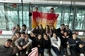 Group of people celebrating on stage