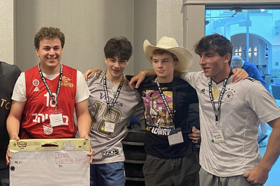 Group of people celebrating on stage