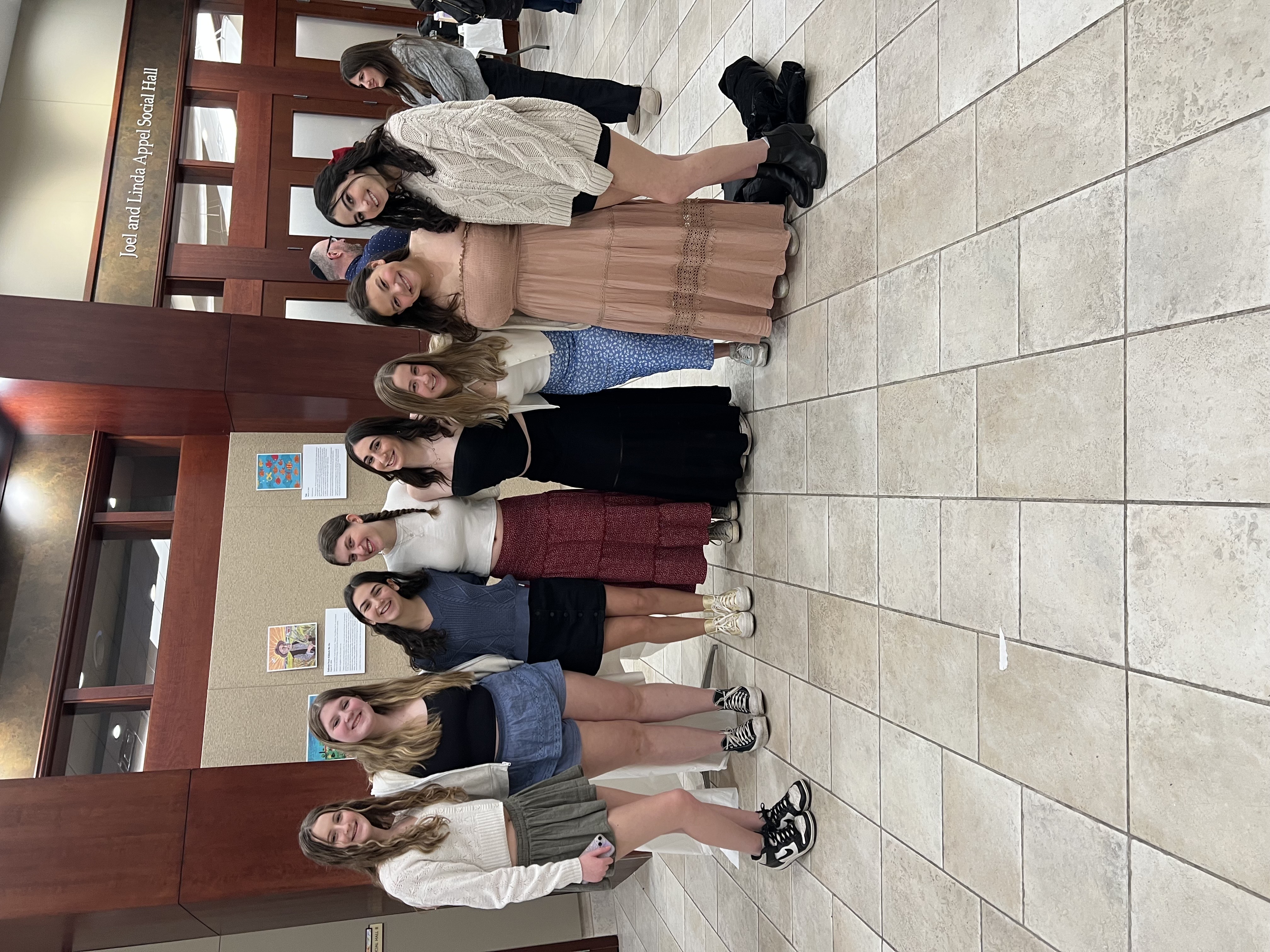 Group of people celebrating on stage