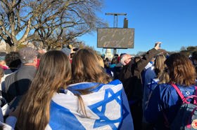 Group of people celebrating on stage