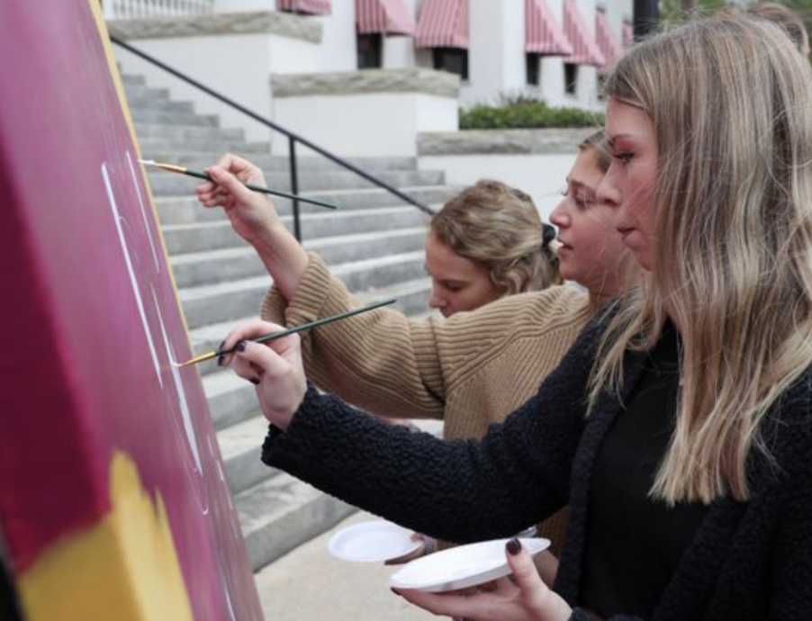 Group of people celebrating on stage