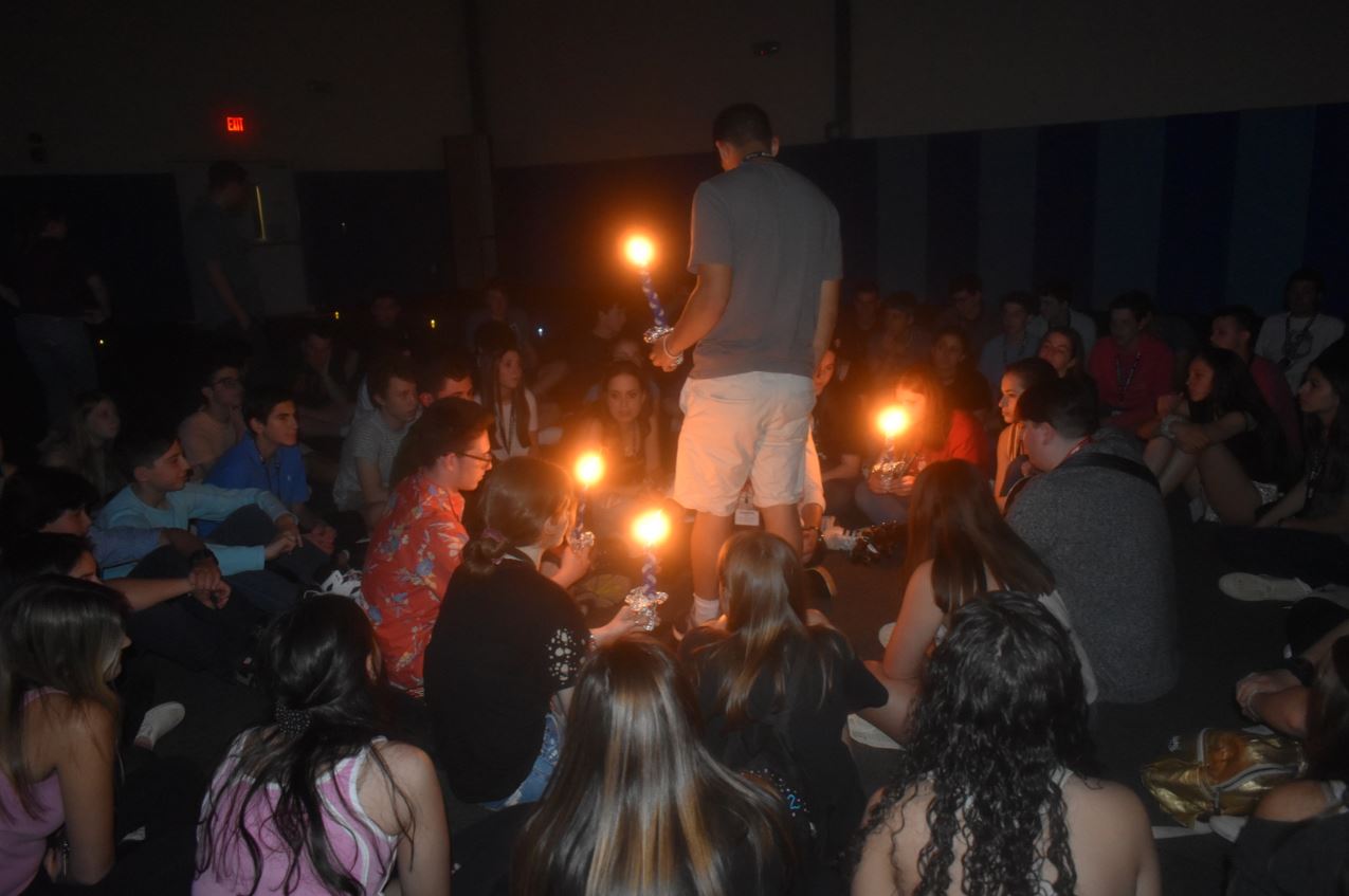 Group of people celebrating on stage