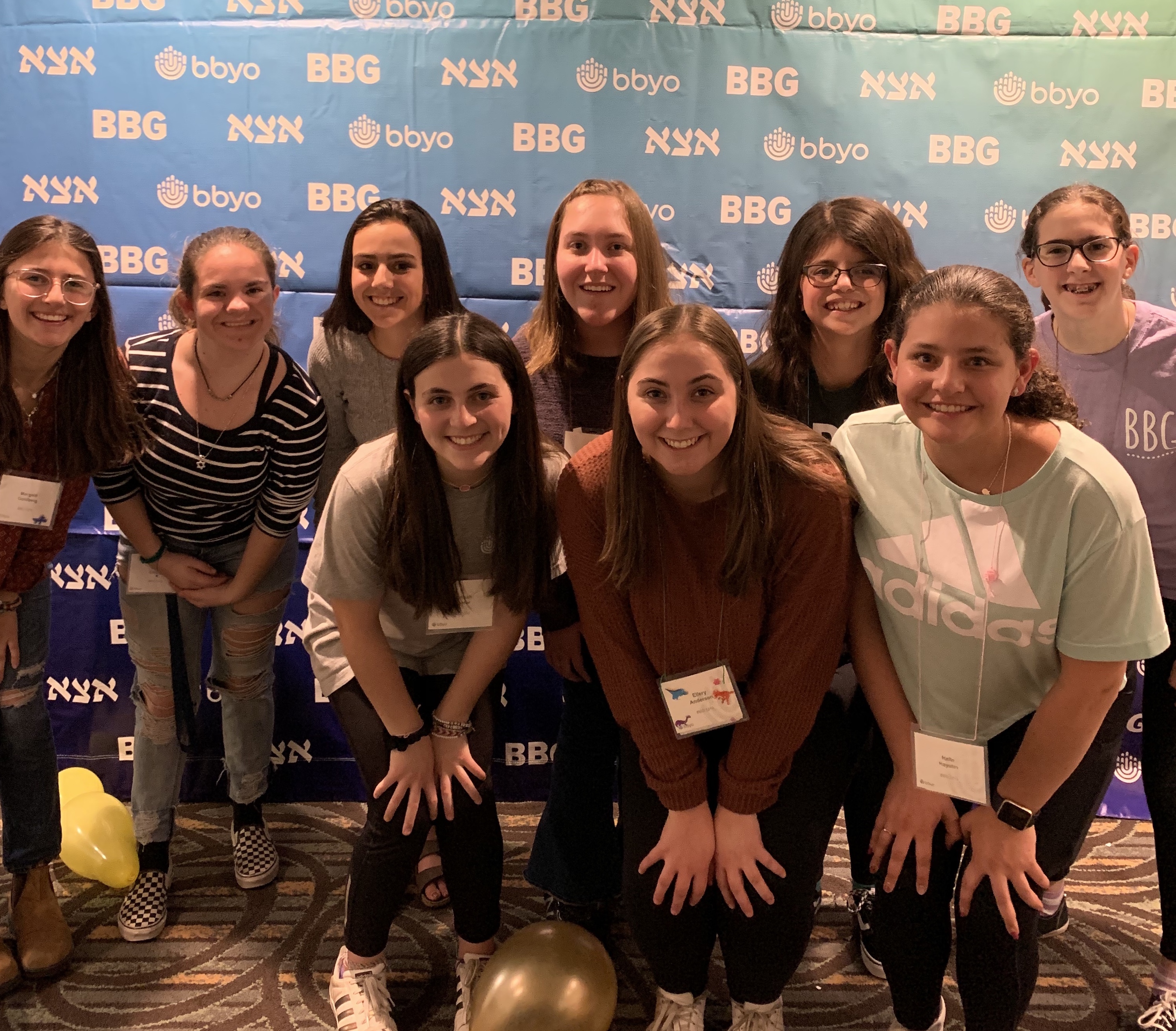 Group of people celebrating on stage
