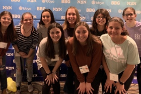 Group of people celebrating on stage