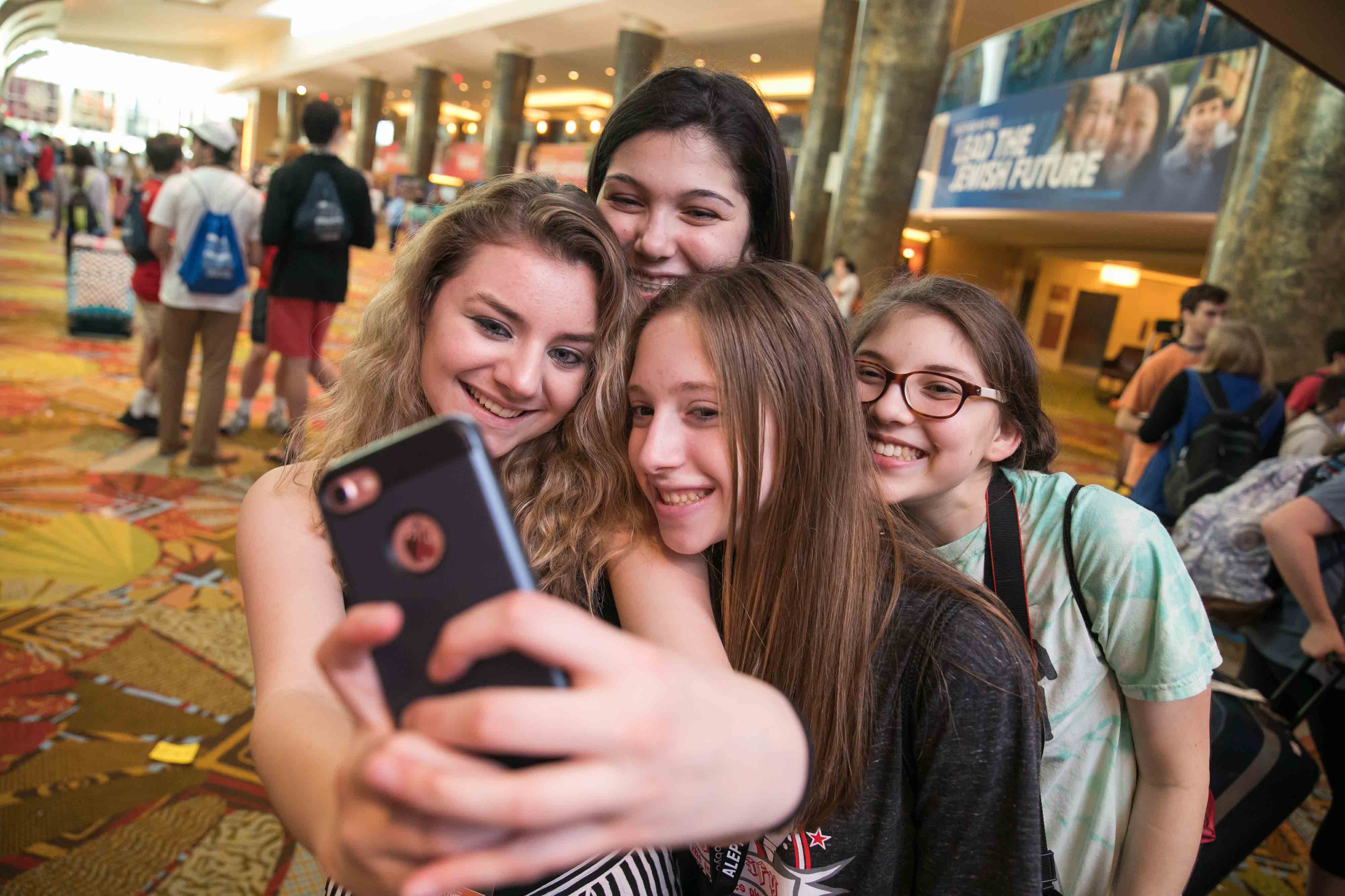 Group of people celebrating on stage