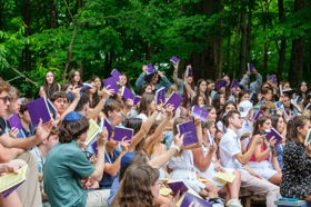 Group of people celebrating on stage