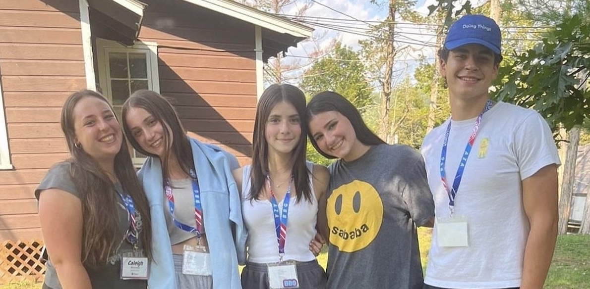 Group of people celebrating on stage