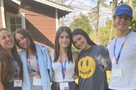 Group of people celebrating on stage