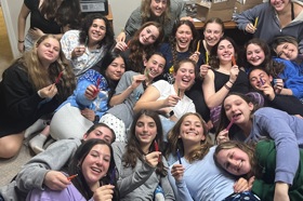 Group of people celebrating on stage