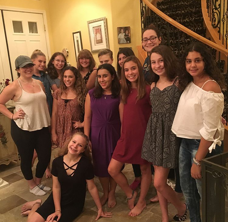 Group of people celebrating on stage