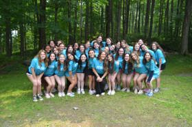 Group of people celebrating on stage