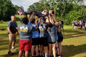 Group of people celebrating on stage