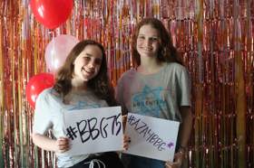 Group of people celebrating on stage