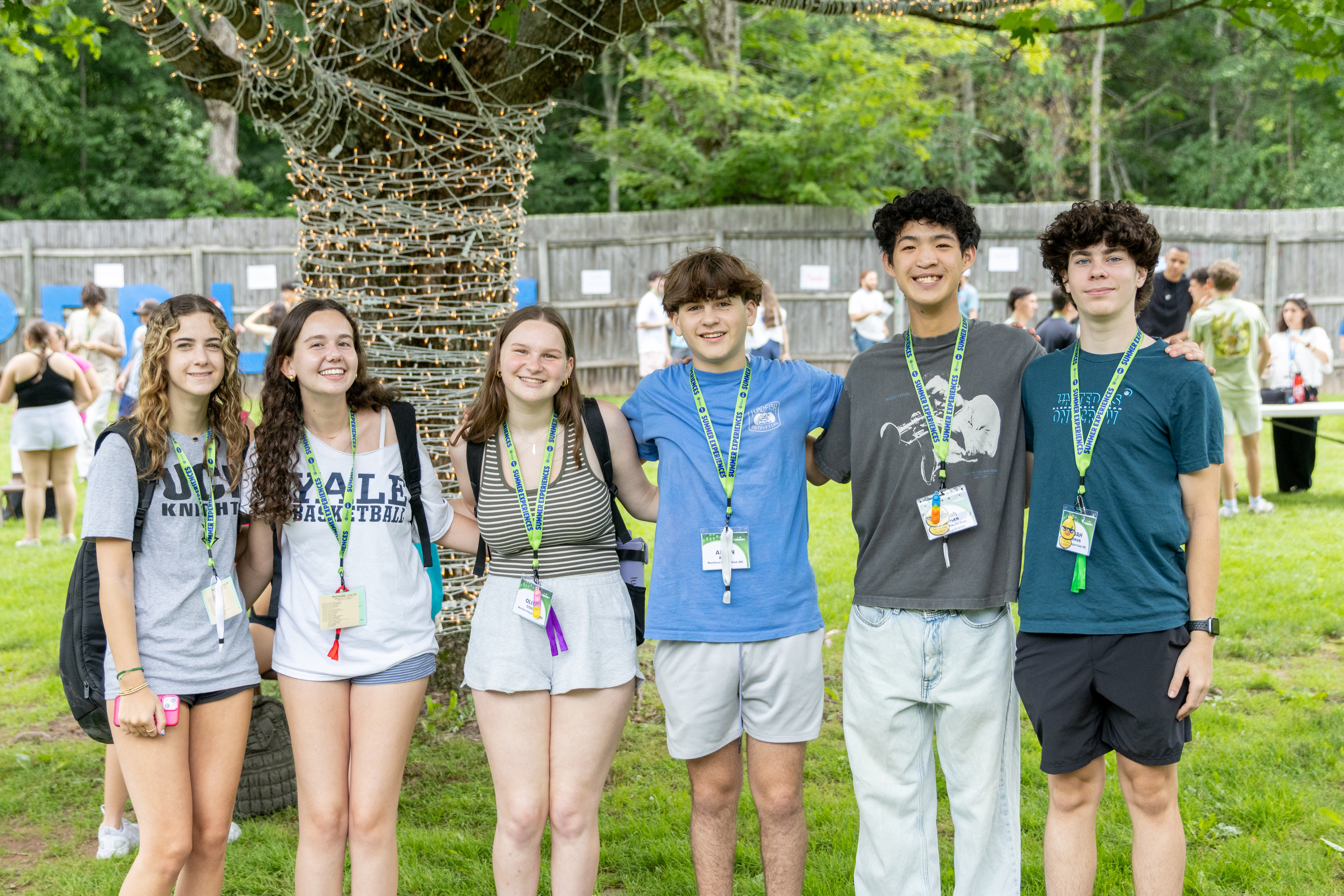 Group of people smiling outdoors