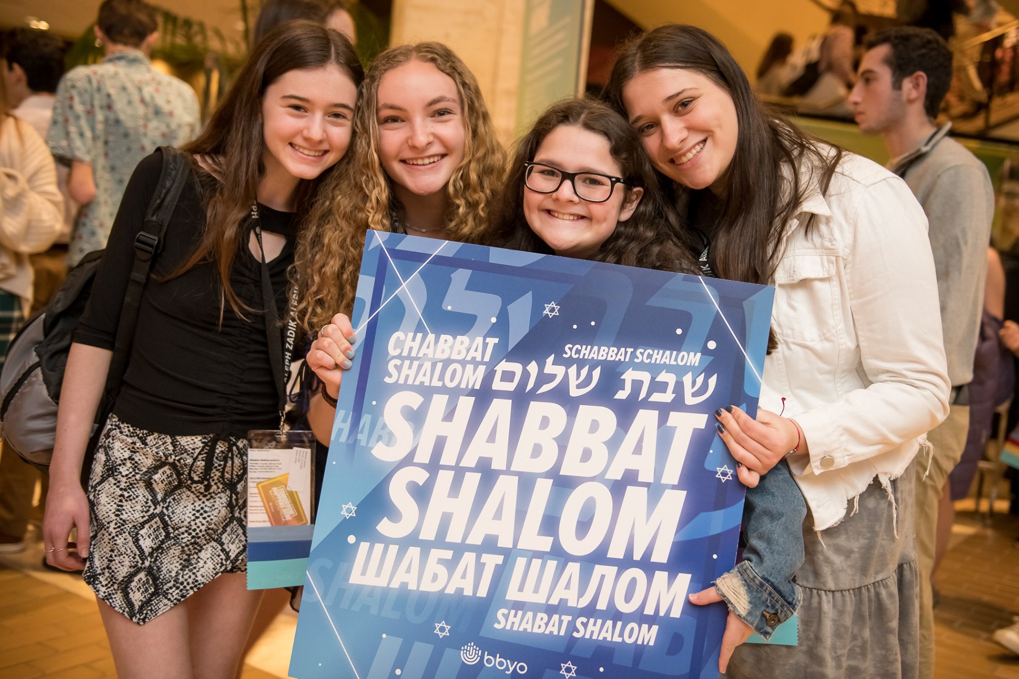 Group of people celebrating on stage