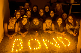 Group of people celebrating on stage