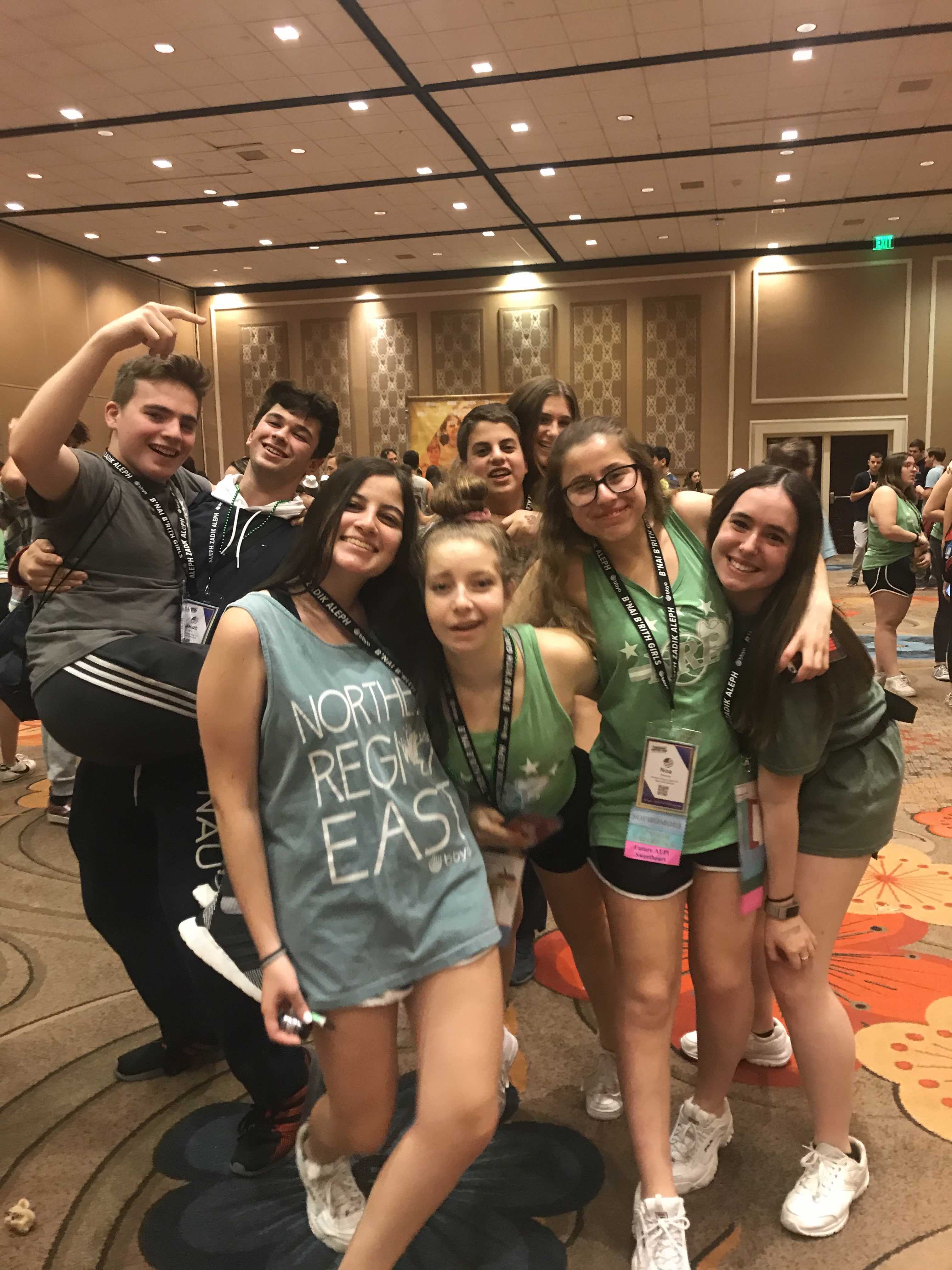 Group of people celebrating on stage