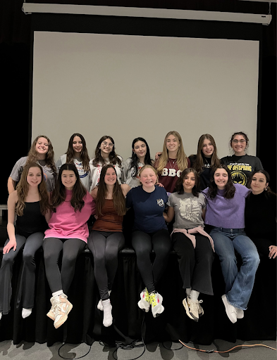Group of people celebrating on stage