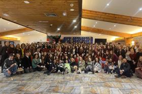 Group of people celebrating on stage