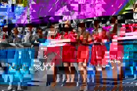 Group of people celebrating on stage