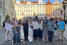 Group of people celebrating on stage