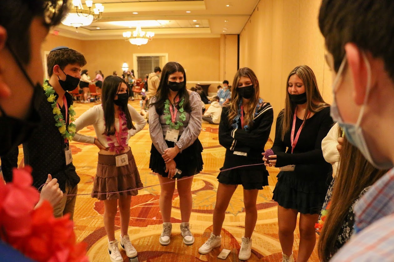 Group of people celebrating on stage