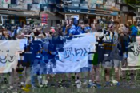 Group of people celebrating on stage