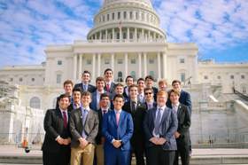 Group of people celebrating on stage