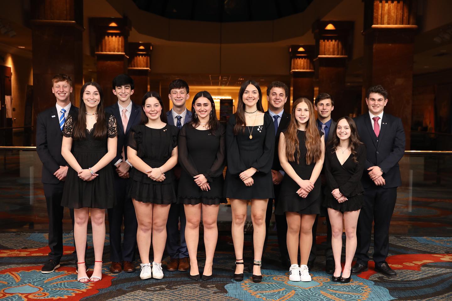 Group of people celebrating on stage