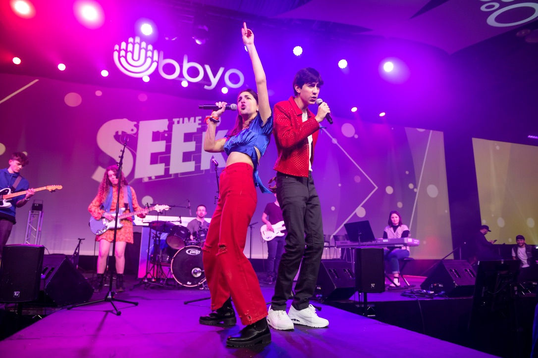 Group of people celebrating on stage