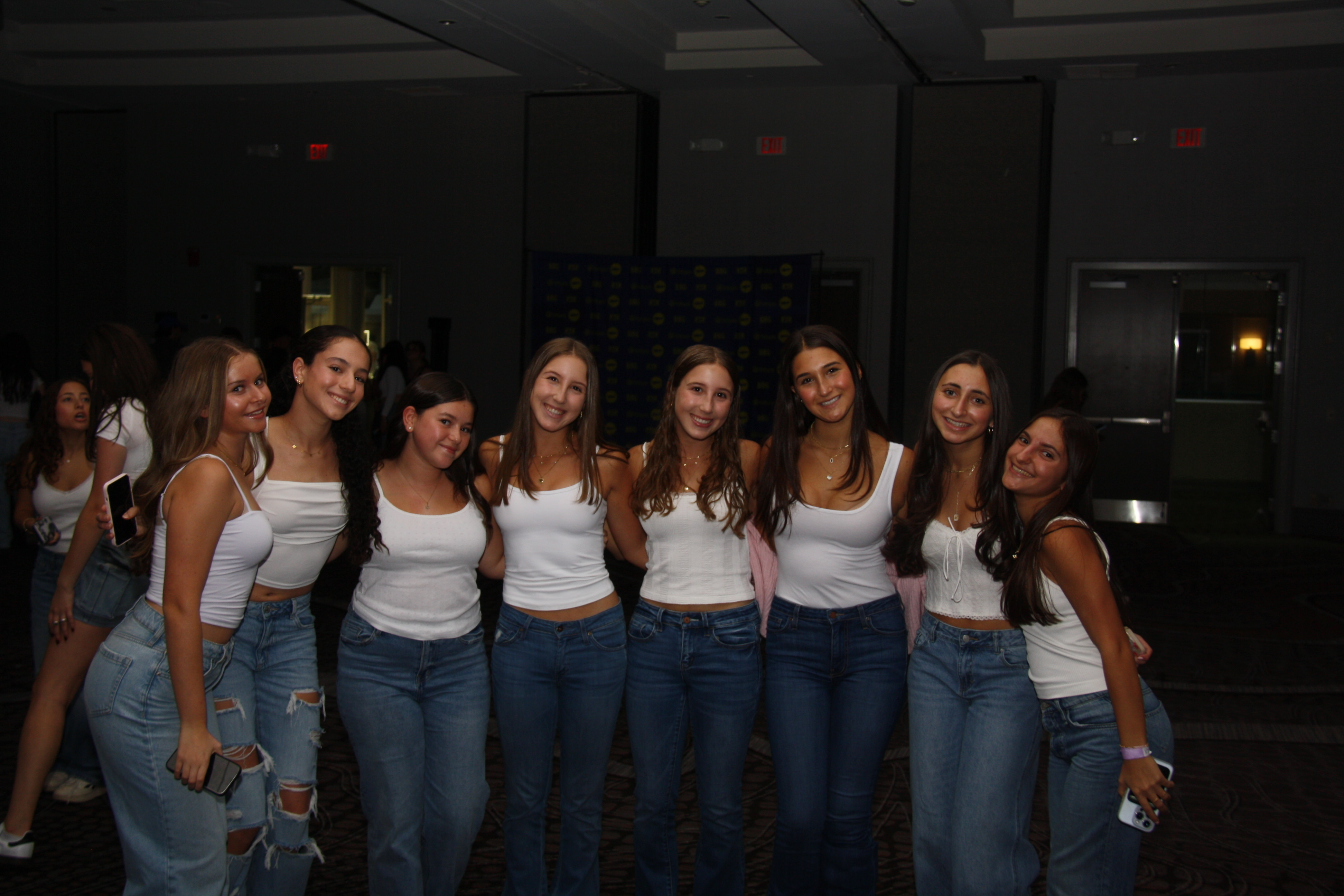 Group of people celebrating on stage