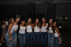 Group of people celebrating on stage