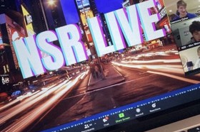 Group of people celebrating on stage