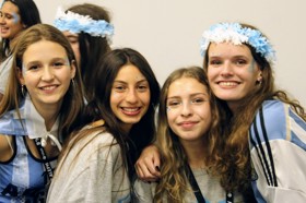 Group of people celebrating on stage