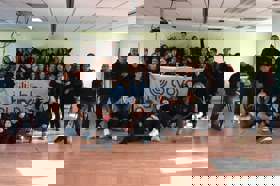 Group of people celebrating on stage