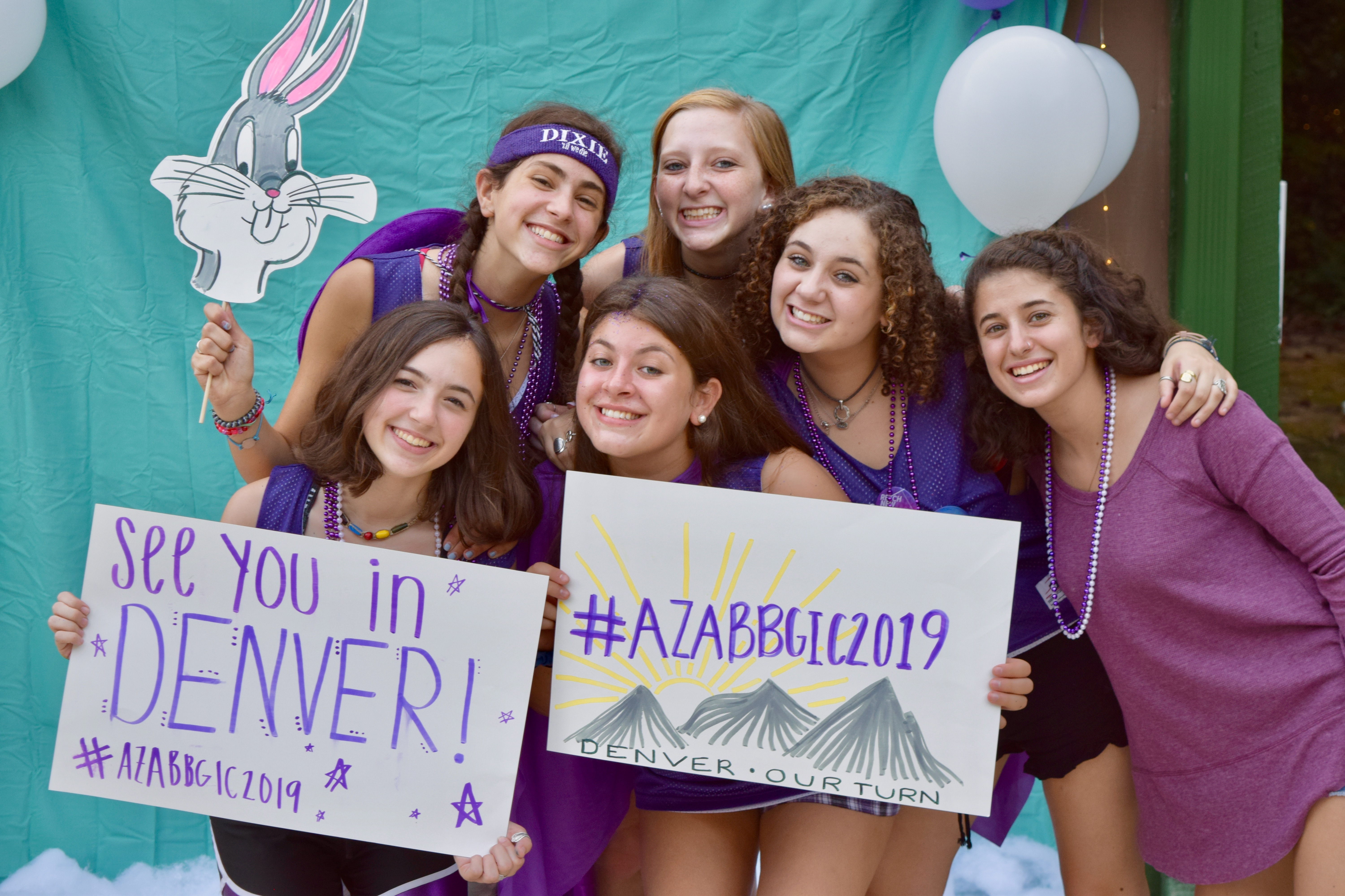 Group of people celebrating on stage