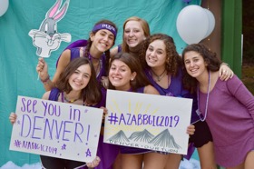 Group of people celebrating on stage