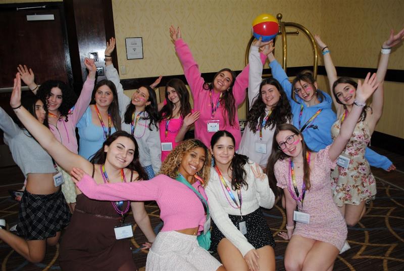 Group of people celebrating on stage