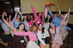 Group of people celebrating on stage